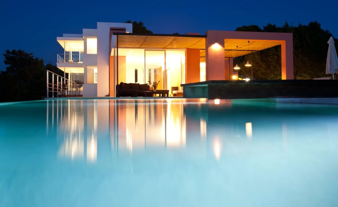 1681371384-Luxury real estates villa to rent Ibiza Azur 49 night view pool.webp